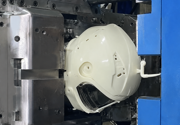Boîtier robotique dans un moule d’injection